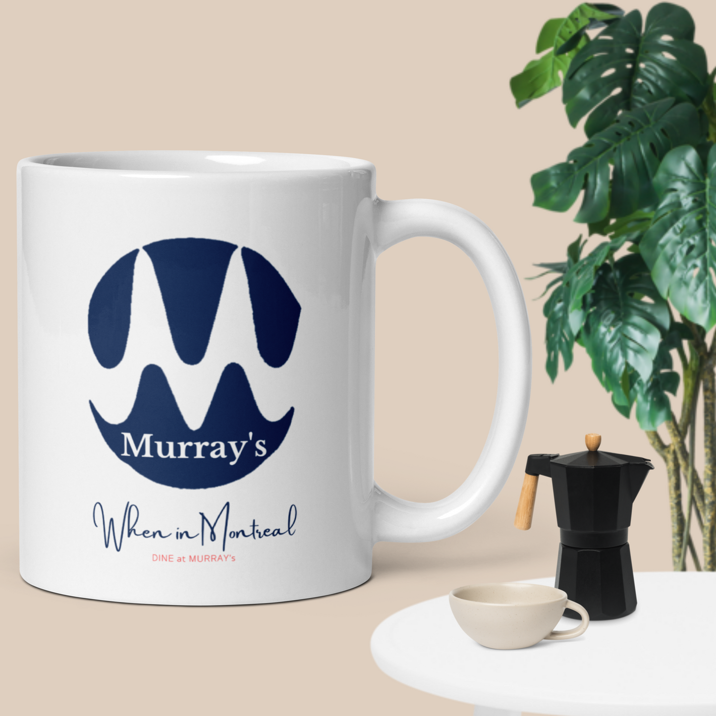 This 11 ounce white mug has the Murray's Restaurant logo printed on it.